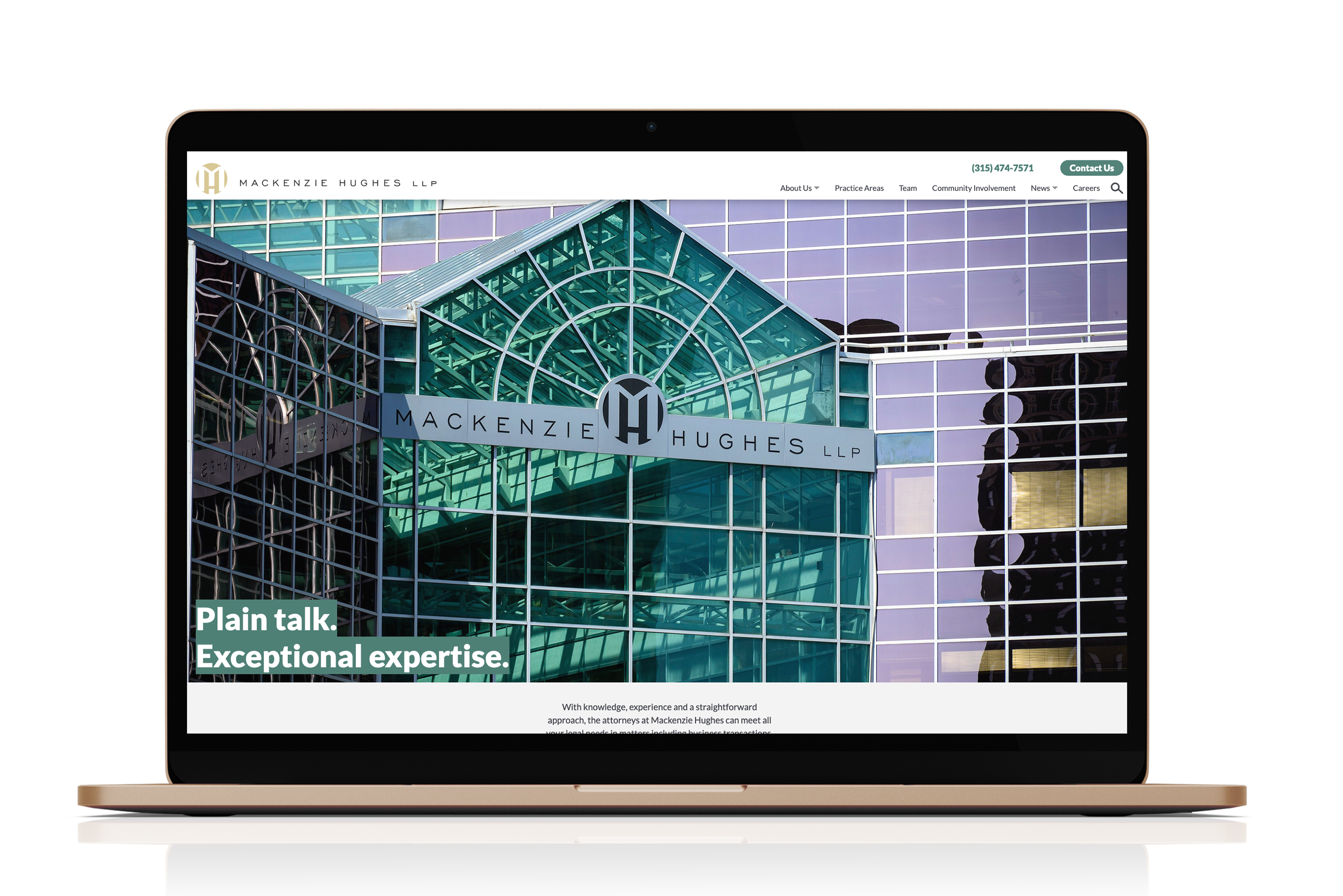 Mackenzie Hughes law firm website displayed on a laptop